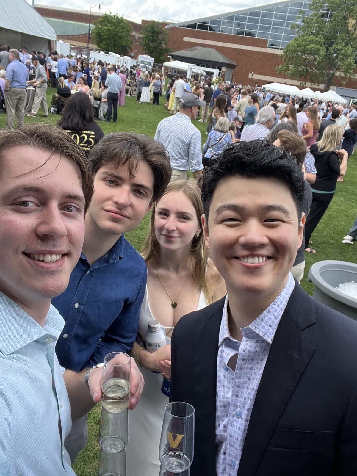 Henry with friends at graduation